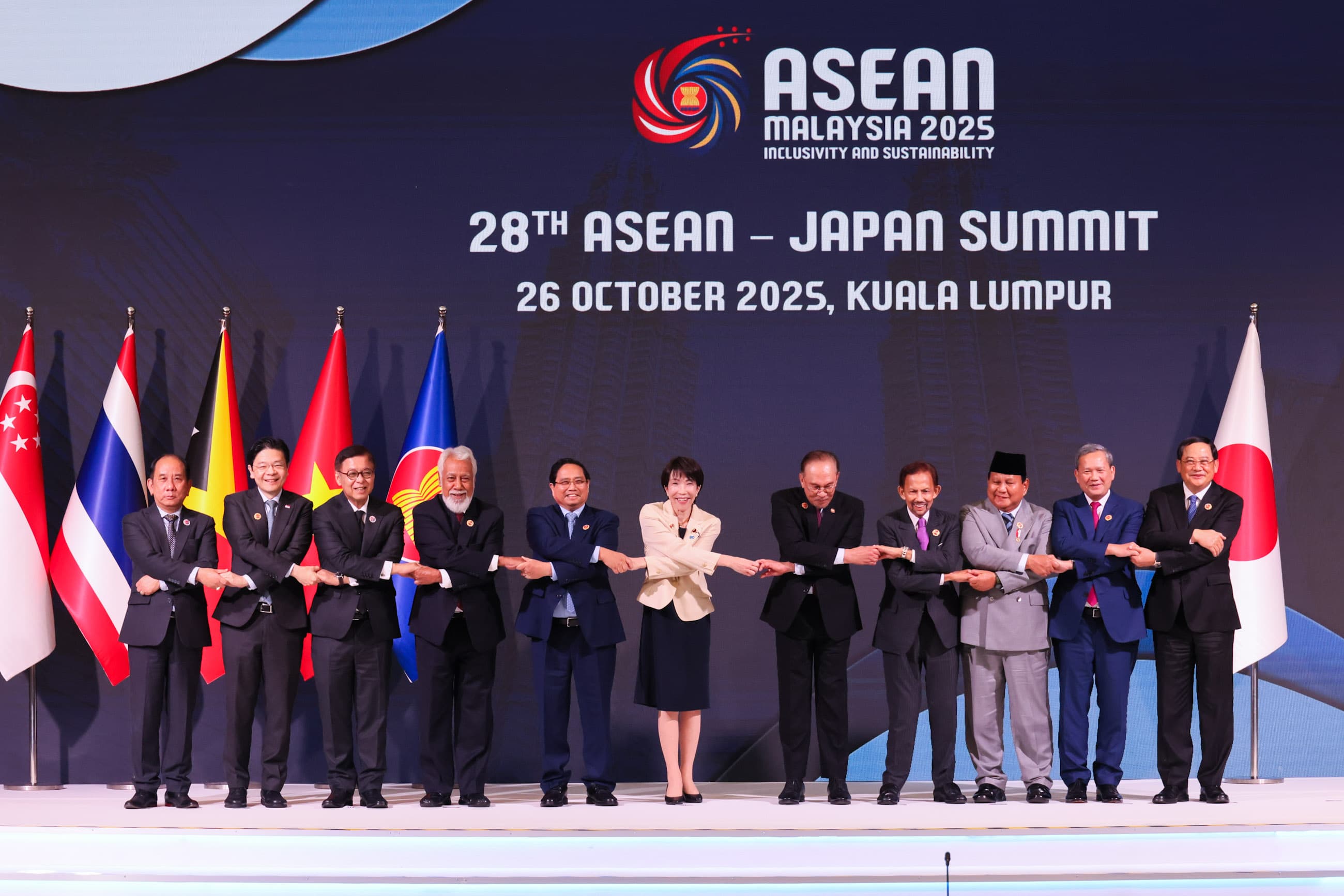 ASEAN and Japan leaders holding hands at the 28th ASEAN-Japan Summit, Kuala Lumpur, October 2025
